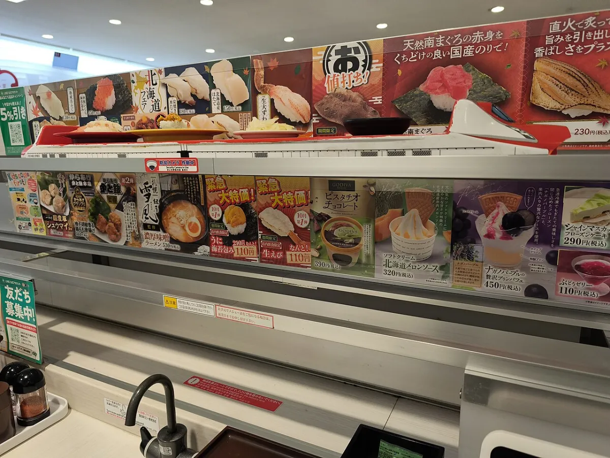 Bullet train shaped tray delivering sushi plates on the express lane at Uobei, one of the fastest sushi chains in Japan